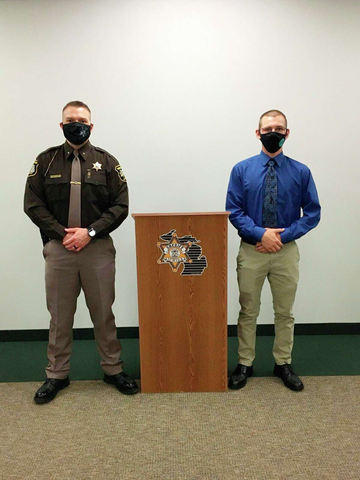Brendan Cook (right) stands near Manistee County Sheriff Brian Gutowski during an orientation for the Manistee County Sheriff's Office's new apprenticeship program that started this month. (Courtesy photo)