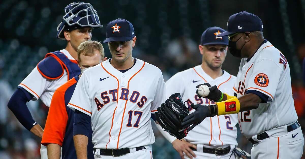 Houston Astros starting pitcher Jake Odorizzi (17) exits the game after facing one Los Angeles Angels batter in the first inning of an MLB game at Minute Maid Park on Saturday, April 24, 2021, in Houston.
