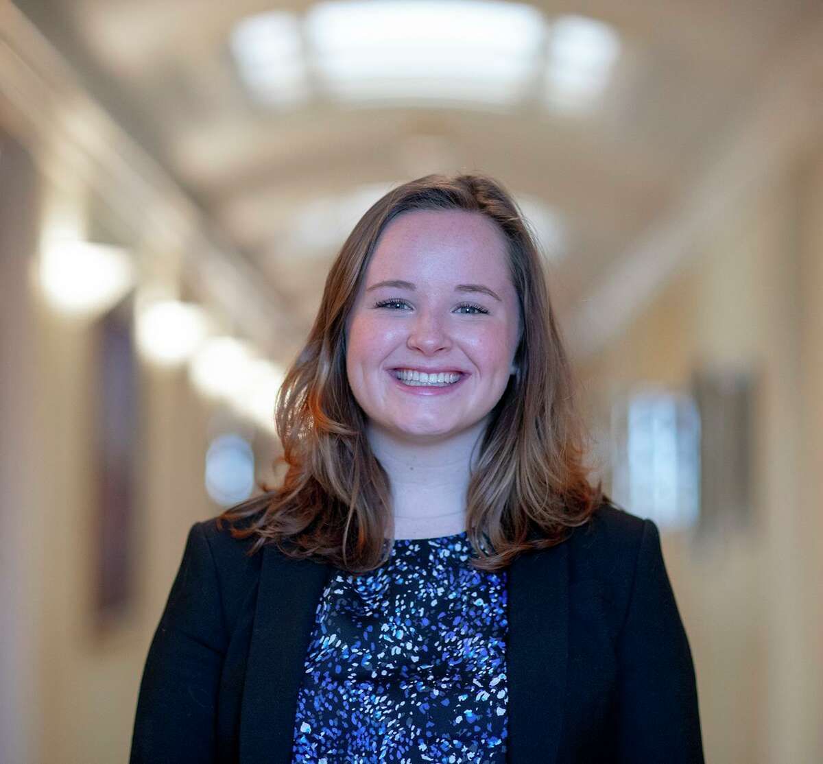 Christine Walsh of Milford will spend the next year volunteering with a community food bank in Tucson, Ariz.