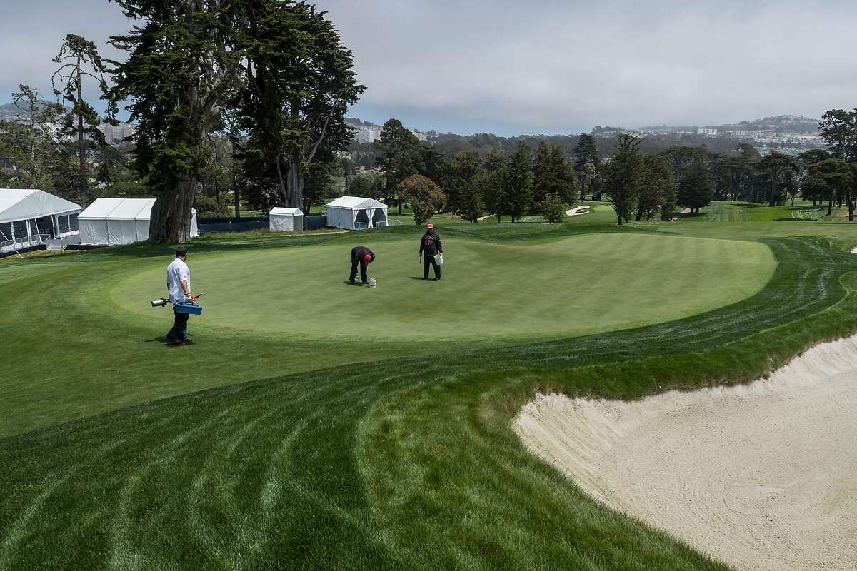 Groundskeepers tend to the greens at the Olympic Club where the US Women’s Open will be held next week San Francisco, Calif., on Tuesday, May 25, 2021.