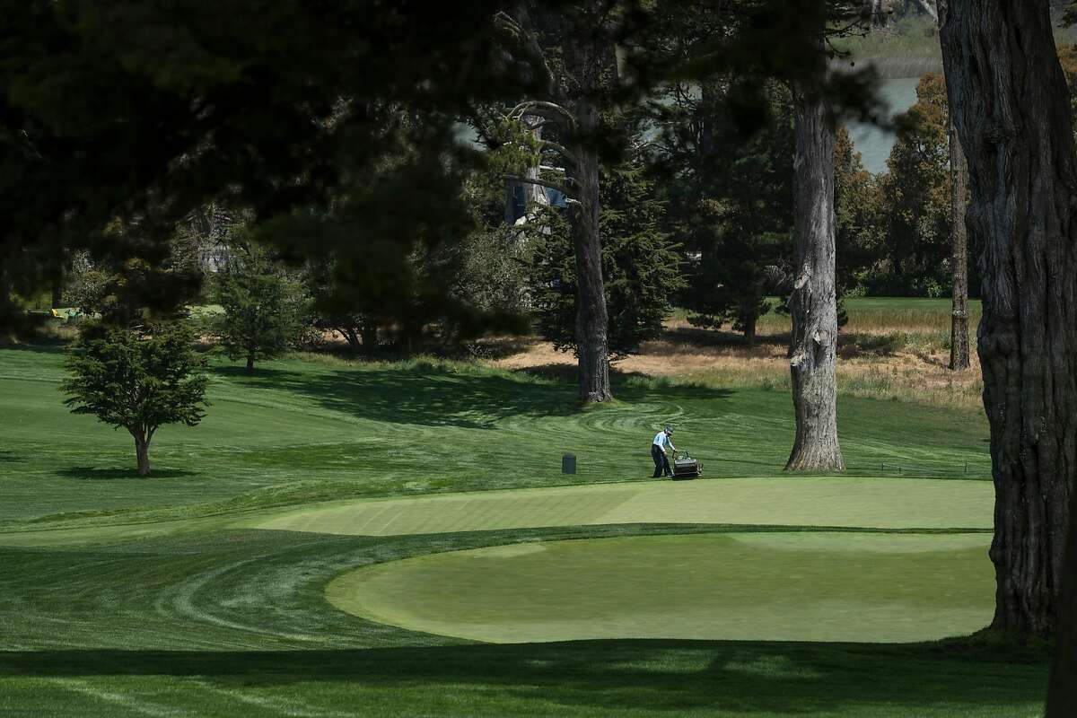 Groundskeepers tend to the greens at the Olympic Club where the US Women’s Open will be held next week San Francisco, Calif., on Tuesday, May 25, 2021.