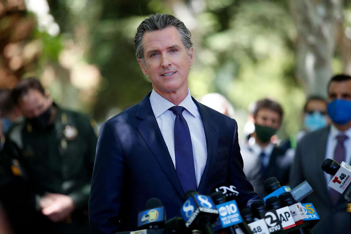 Gov. Gavin Newsom has issued 14 pardons, 13 commutations and eight medical reprieves, including a pardon for Laos-born Bounchan Keola, who was injured while battling the Zogg Fire near Redding last fall.
