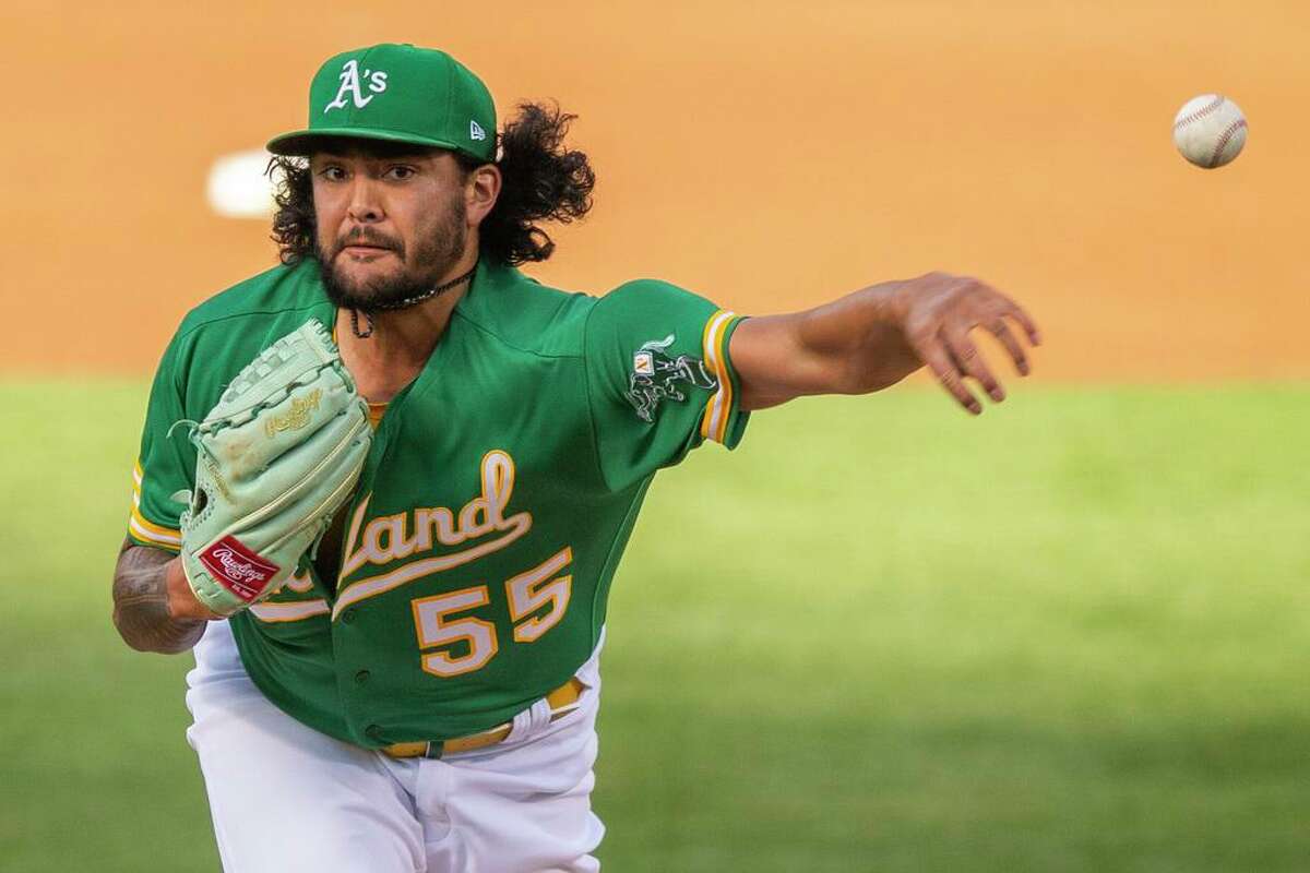 Oakland Athletics starting pitcher Sean Manaea (55) in the first inning during an MLB game against the Los Angeles Angels at RingCentral Coliseum on Friday, May 28, 2021, in Oakland, Calif.