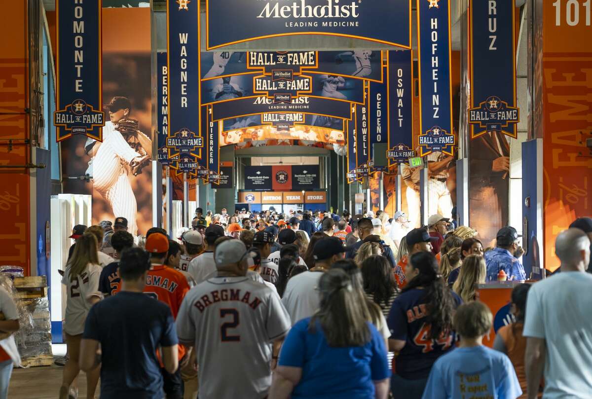 Fans shop in the Houston Astros team store prior to game one of the