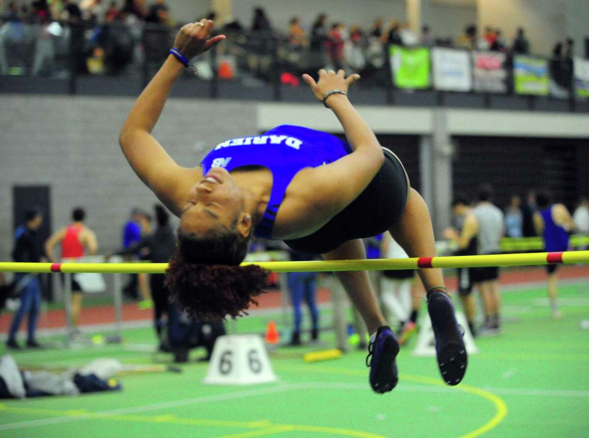 Darien's Chelsi Chevannes competes in the high jump during FCIAC Track Championship action in New Haven, Conn., on Thursday Feb. 6, 2020.