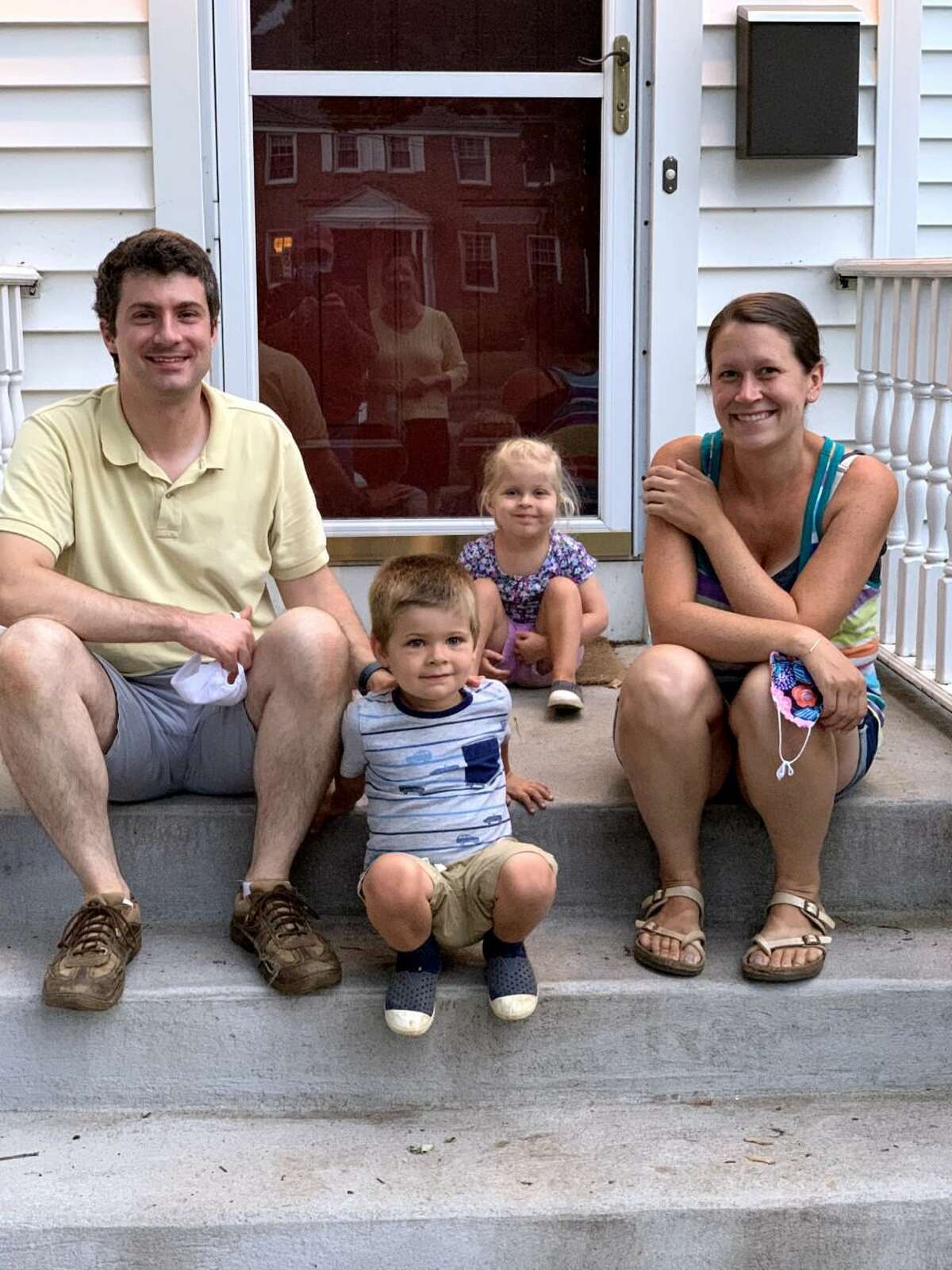 Jim and Emily Cornacchio of West Hartford, with their 3-year-old twins, Benjamin and Hailey.