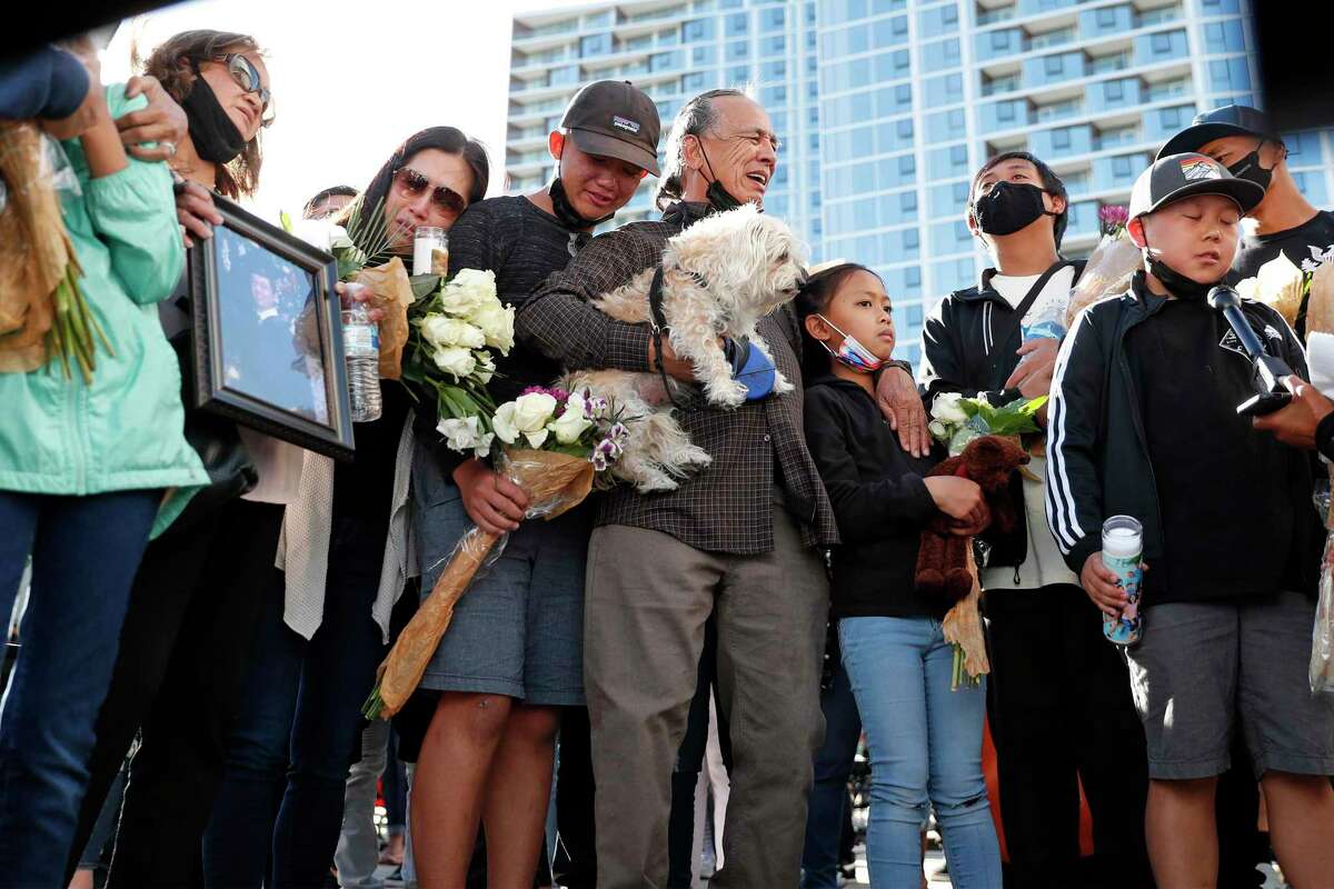 The family of Paul Megia mourns during a public vigil at San Jose City Hall for victims of last month’s mass shooting.