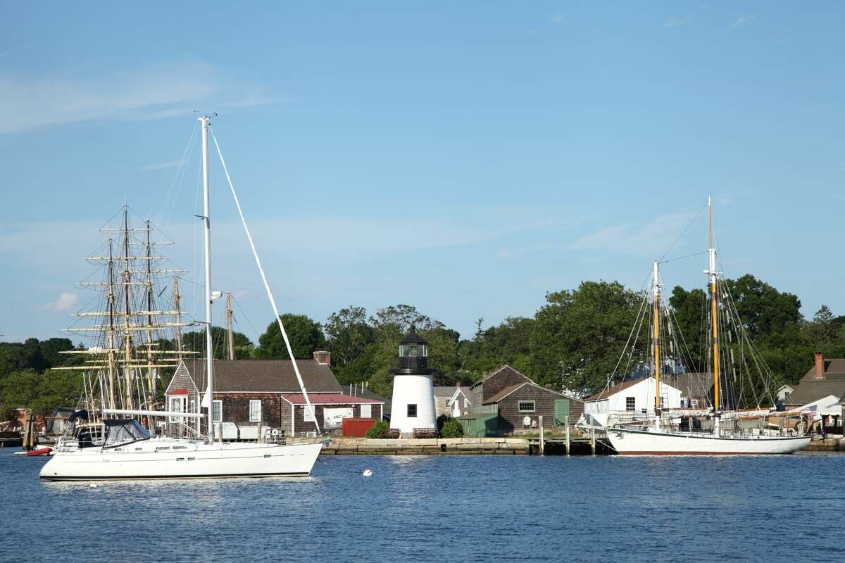 Mystic is a village in New London County, Connecticut, in the United States. Mystic is located within the towns of Groton and Stonington. Mystic is a major New England tourist destination. The village is known for its maritime heritage, historic ship-captain's homes, excellent dining and two immense casinos