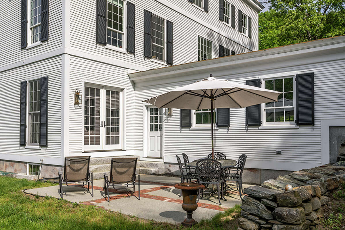 The exterior of the home on 92 Judds Bridge Road in Roxbury, Conn. has a walkout lower level. 