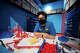 Legoland Discovery Center Bay Area's Master Model Builder Sam Suksiri in his Legoland office.