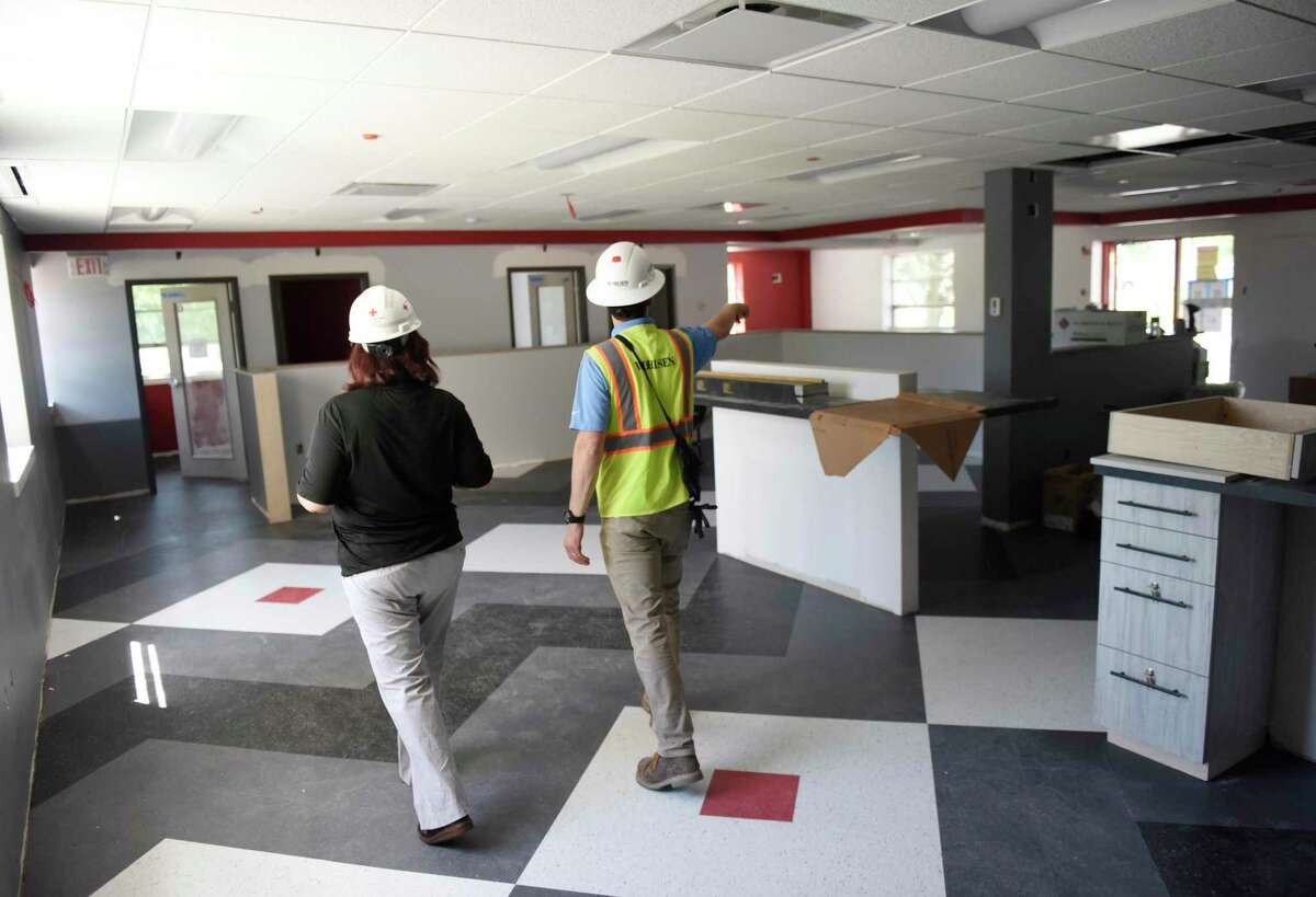 External Affairs Officer Desiree Ramos, left, and Project Superintendent James Thompson show the blood donation area of the renovated American Red Cross Greenwich Headquarters in Greenwich, Conn. Thursday, May 27, 2021. The facility, located at 99 Indian Field Road, is undergoing a major construction renovation project and has just surpassed $1 million in fundraising.