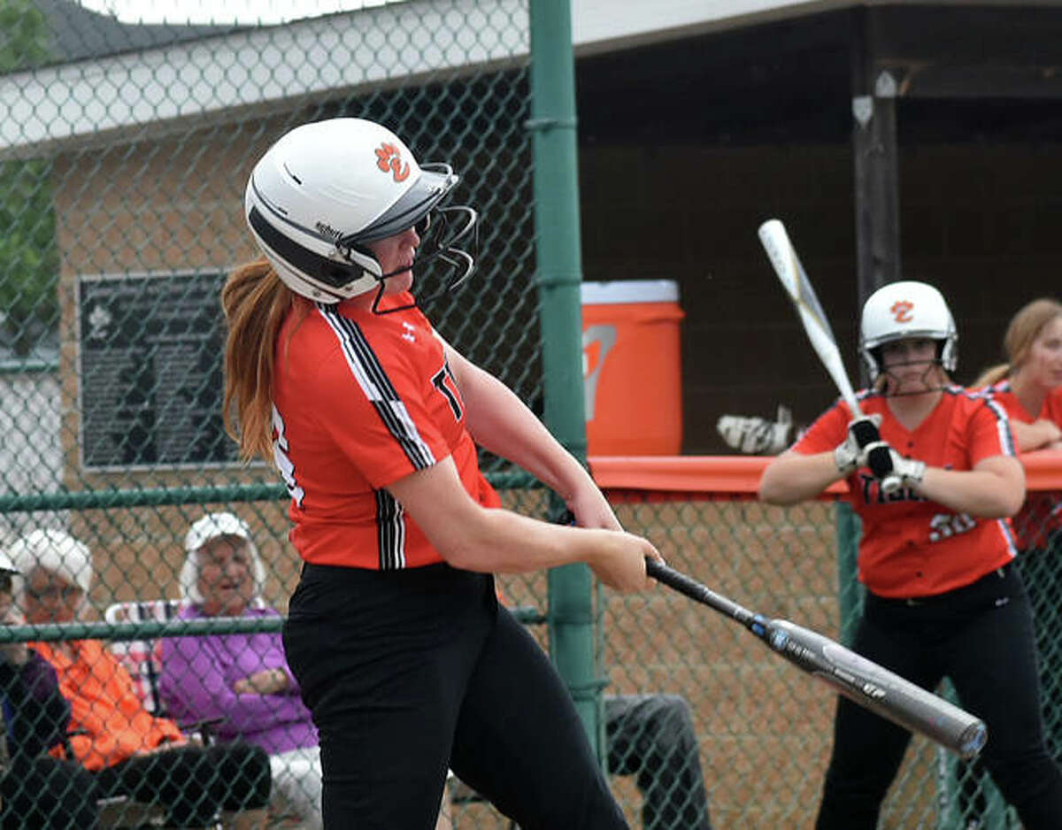 Edwardsville’s Brooke Tolle connects for a two-run home run in the first inning against Granite City.