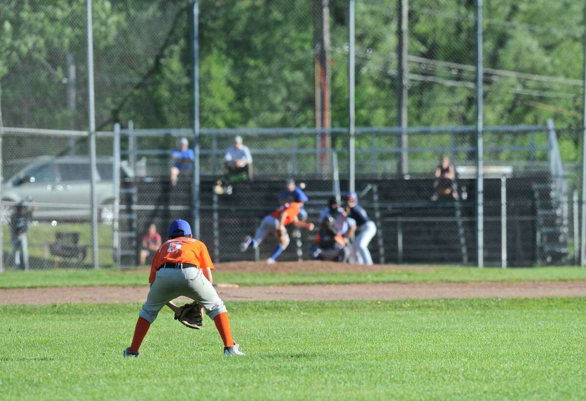 Danbury Youth Baseball team plays in Rogers Park on Tuesday night, June 14, 2016, in Danbury, Conn.