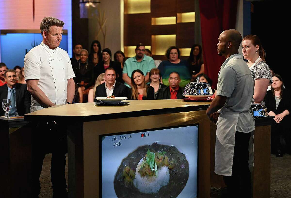 Chef/host Gordon Ramsay and Hell’s Kitchen contestants Jayaun Smith and Morgana Vesey, far right, in the “Young Guns: Young Guns Come Out Shooting” season premiere on May 31.