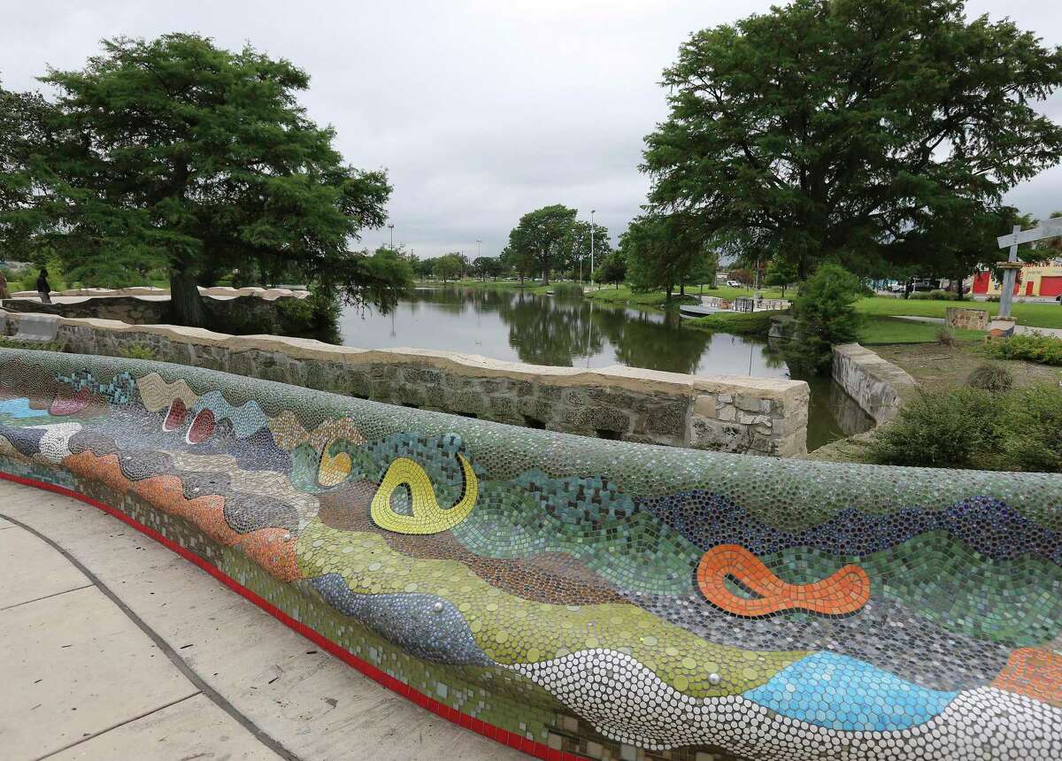 Colorful seating areas provide public art at Elmendorf Lake Park, which underwent an extensive facelift, including construction of trails and environmental upgrades, under a $15 million city-county project from 2017. Local officials now are hailing a federal commitment of $75 million for the Westside Creeks Ecosystem Restoration Project that will improve 11 miles of the Alazan, Apache, Martinez and San Pedro creeks. Apache Creek flows into Elmendorf Lake.