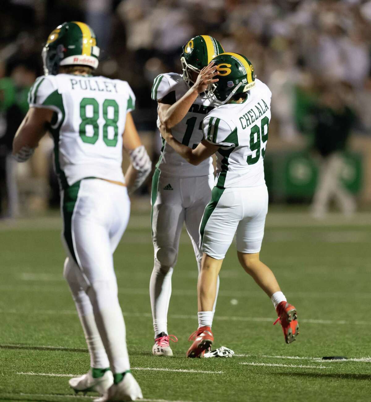Giancarlo Chelala (99) of the Stratford Spartans celebrates with William Kight (13) after his field goal tied the score at 3-3 with Memorial Mustangs during a High School football game on Friday, October 30, 2020 at Tully Stadium in Houston Texas.