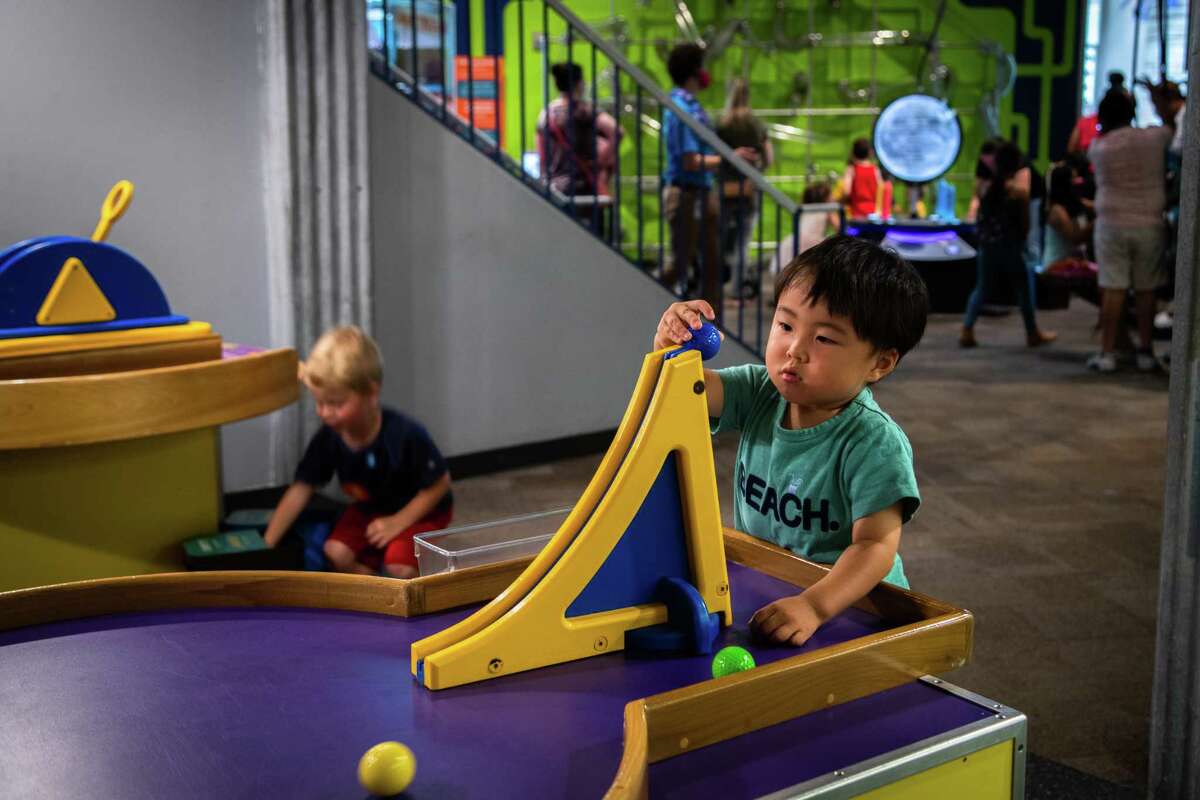Kaishin Paku, 2, interacts with the How Does It Works? exhibition at the Children's Museum of Houston, Thursday, June 3, 2021, in Houston.