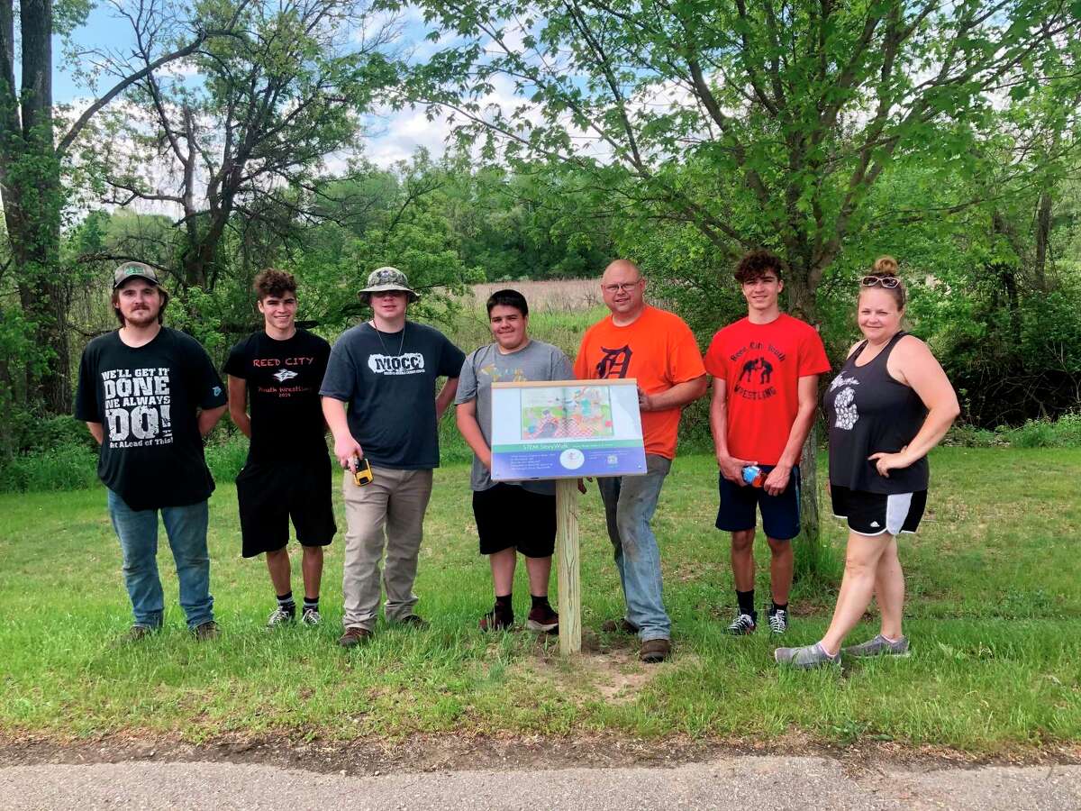 The StoryWalk project was constructed in Westburg Park with the help of some Boy Scout volunteers from Reed City Troop 74 and members of the Cargill Cares Team volunteers. (Photo Courtesy/Lyndsey Eccles-Burchett)