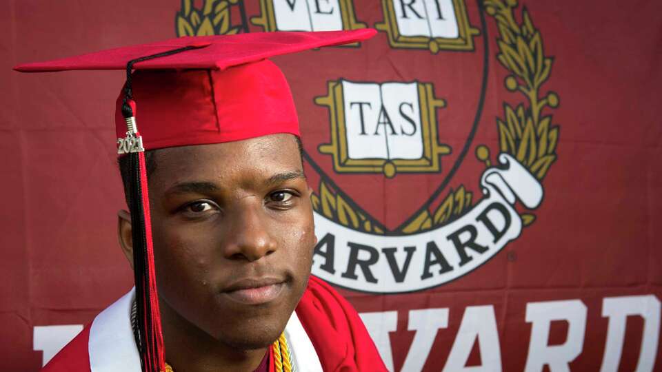 Westfield High School valedictorian Da’Vion Tatum poses for a portrait Tuesday, June 1, 2021 in Houston. The Harvard University-bound senior was accepted into seven Ivy League colleges,and offered $700,000 in scholarships. Tatum says he taught himself algebra in first grade.