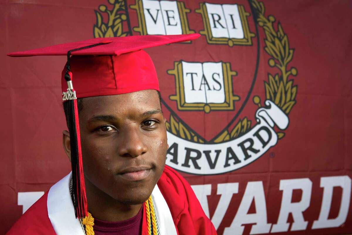 Westfield High School valedictorian Da'Vion Tatum poses for a portrait Tuesday, June 1, 2021 in Houston. The Harvard University-bound senior was accepted into seven Ivy League colleges,and offered $700,000 in scholarships. Tatum says he taught himself algebra in first grade.