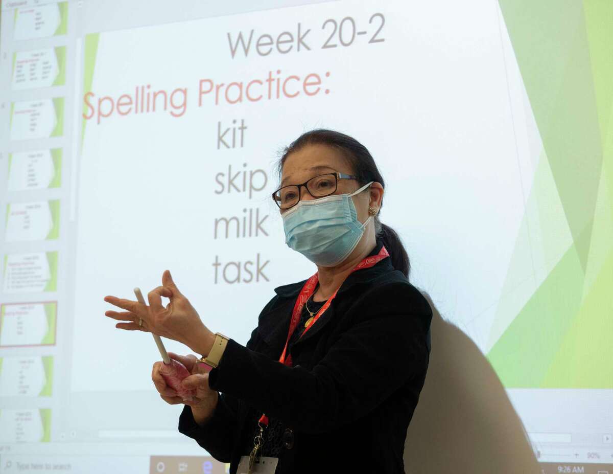 DeAnda Elementary School kindergaten dual language teacher Evangeline Gabriel, pictured in February, delivers instruction during a class at her Houston ISD campus. HISD teachers would continue to earn base salaries that rank near the bottom in the region under the district’s 2021-22 budget proposal.