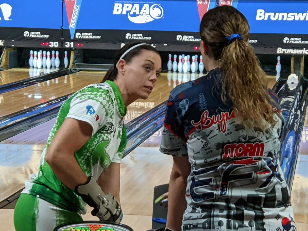 Shannon O'Keefe, left, chats with a fellow competitor Thursday, June 3, 2021, during a practice session for the PWBA Albany Open at Kingpin's Alley in South Glens Falls. (Pete Dougherty/Times Union)
