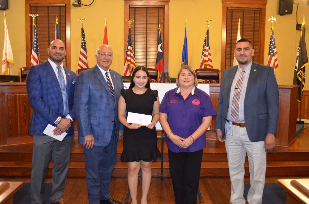 For the 15th year, the GEO Group and the Webb County Commissioners Court awarded a total of $25,000 in scholarships to area students. Due to the coronavirus pandemic, no in-person ceremony was held. Pictured is one of the recipients from last year along with Judge Tano Tijerina and Webb County Commissioner “Wawi” Tijerina.