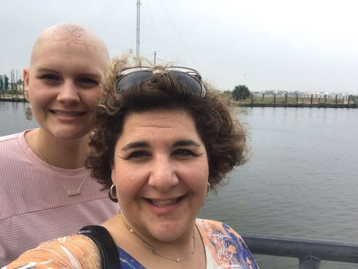 League City teacher Harriet Hayes with daughter Emily Hayes. Emily, who was diagnosed with Stage 1 breast cancer at age 21, opted for an aggressive treatment regimen that included 13 rounds of chemo.