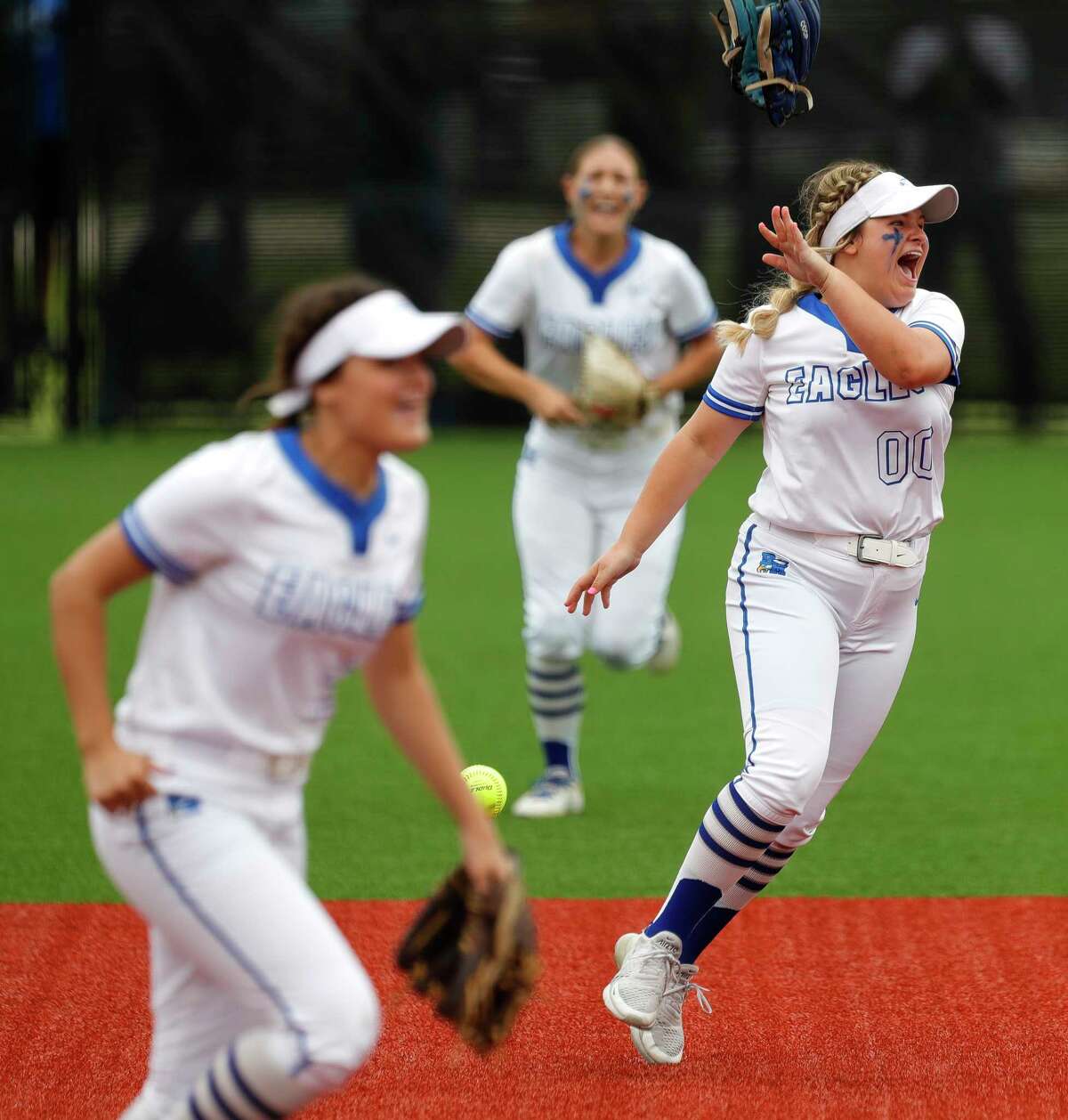 Barbers Hill shortstop Katelynn Cooper (00) reacts after catching a fly ball by Mallory Pyle for the final out of the game to defeat Hallsville 6-0 and advance to the Class 5A state championship, Friday, June 4, 2021, in Leander.