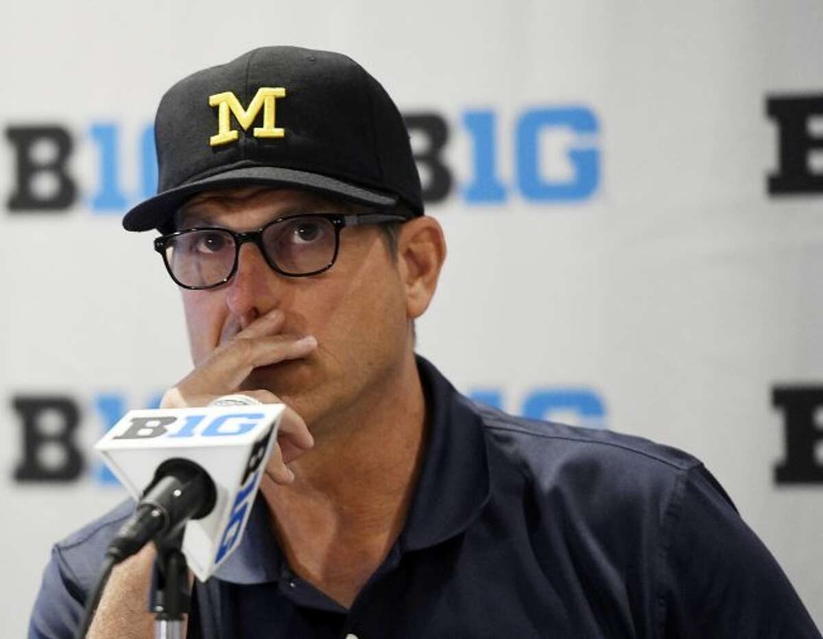 In this July 23, 2018 file photo, Michigan head coach Jim Harbaugh speaks at the Big Ten Conference NCAA college football Media Days in Chicago. Harbaugh was at the Michigan Showcase at Ferris State on Thursday.