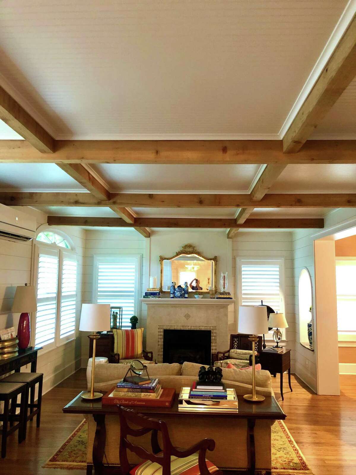The eye-catching coffered ceilings in Helen and Mitch Seal’s Alta Vista home were created with decorative cedar beams and bead board paneling of the kind typically used as wainscoting.
