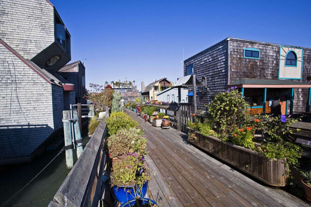 Houses sit on the water by Issaquah Dock of Waldo Point Harbor in Sausalito, Calif.