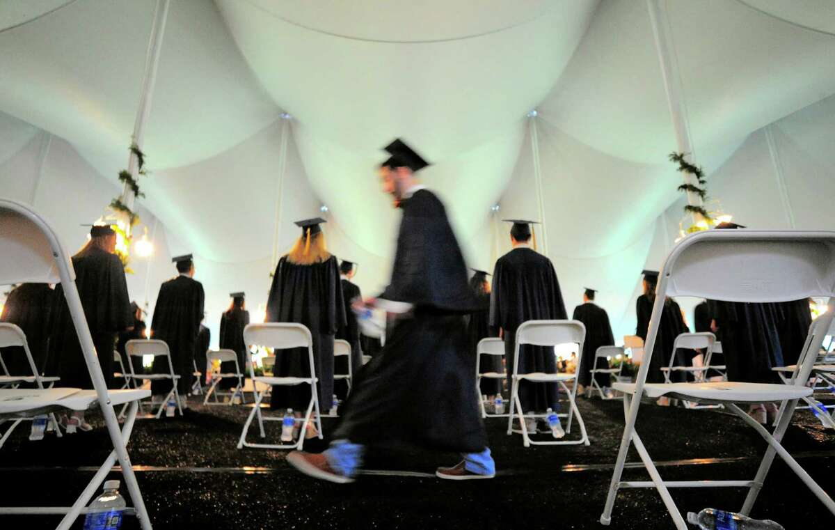 Graduates file to their seats for the start of King School's Commencement Exercises in Stamford, Conn., on Friday June 4, 2021.
