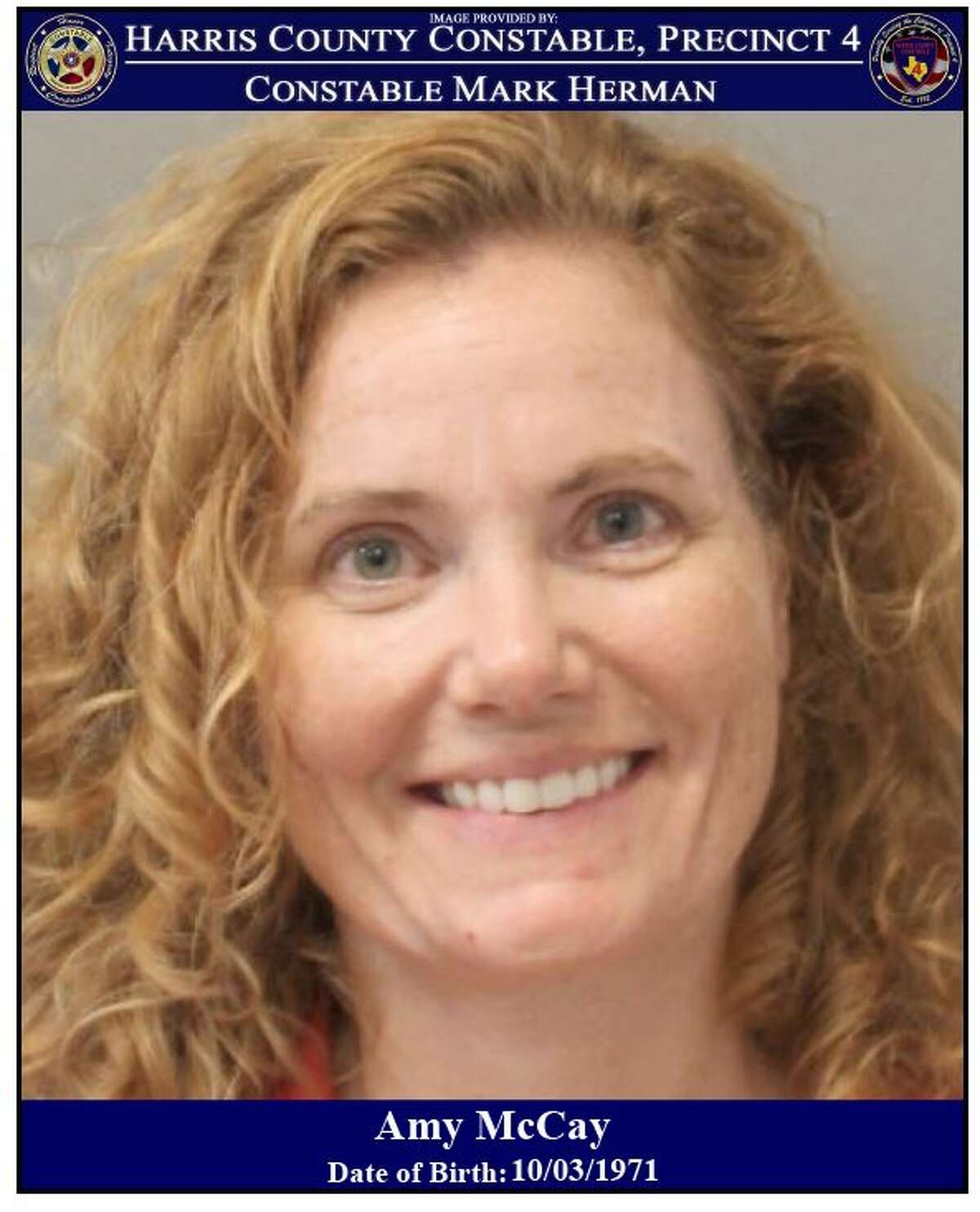 Amy McCay, 49, was arrested after allegedly refusing to wear a mask, coughing on fellow customers and shoving a deputy at Houston Premium Outlets.