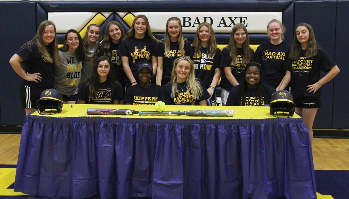 Bad Axe senior Lexi Booms signed a letter of intent Friday to play softball for the St. Clair County Community College Skippers. 