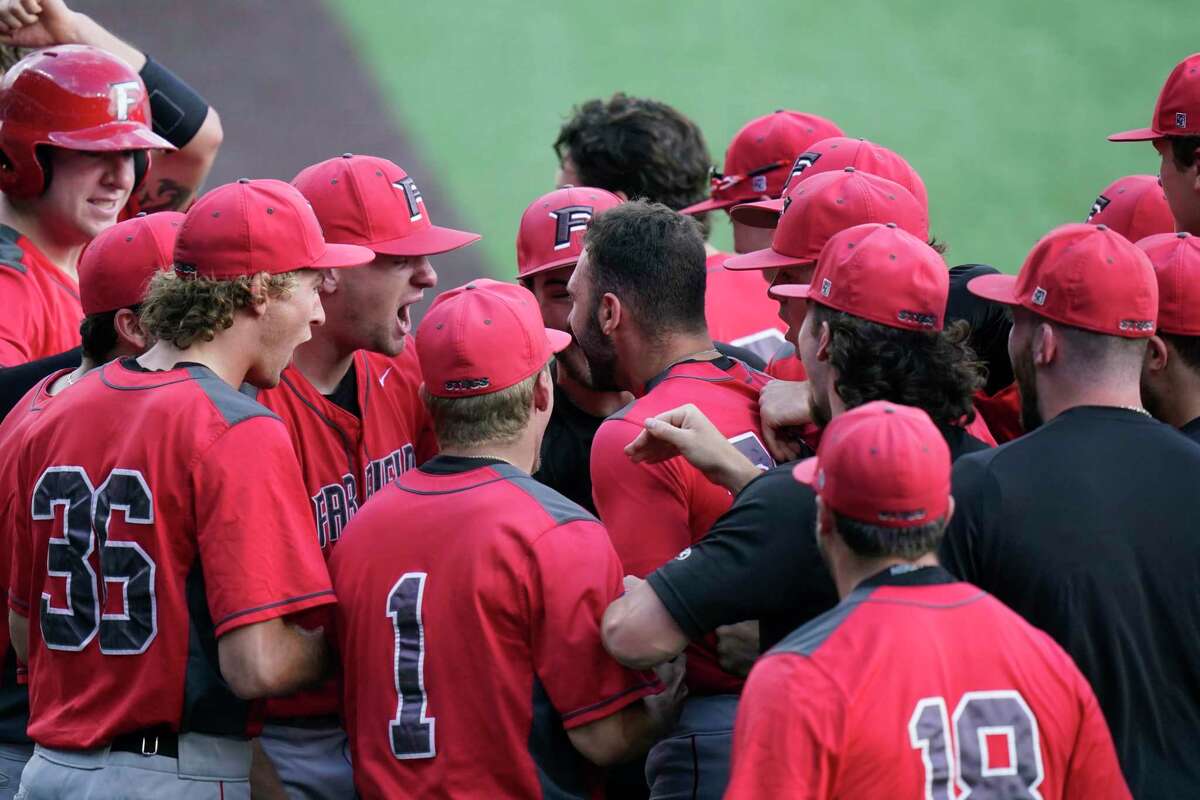 Fairfield's Mike Handal, center, celebrates his solo home run against Arizona State with teammates during the first inning of an NCAA college baseball regional tournament game Friday, June 4, 2021, in Austin, Texas. (AP Photo/Eric Gay)