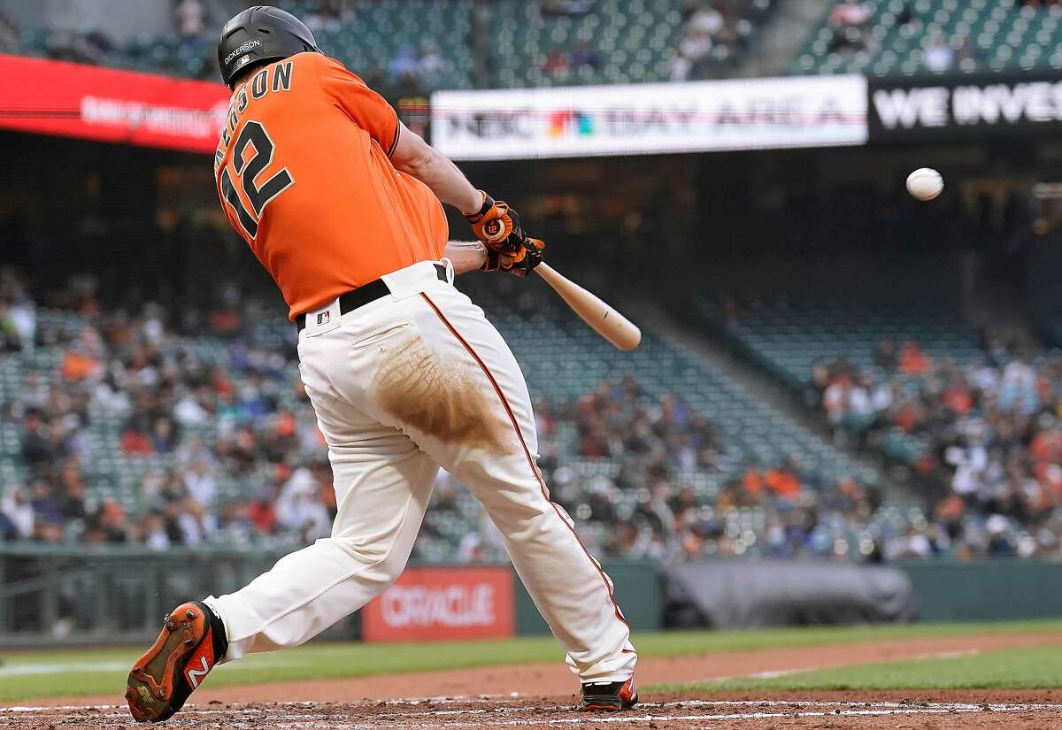 SAN FRANCISCO, CALIFORNIA - JUNE 04: Alex Dickerson #12 of the San Francisco Giants hits a three-run home run against the Chicago Cubs in the bottom of the second inning at Oracle Park on June 04, 2021 in San Francisco, California. (Photo by Thearon W. Henderson/Getty Images)