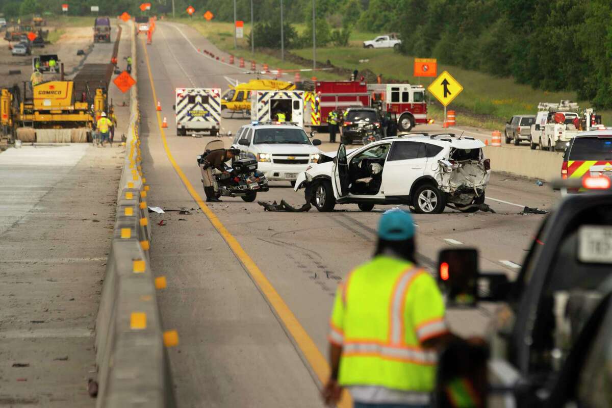 The southbound lanes of U.S. 59 are shut down in Kendleton, in Fort Bend County southwest of Rosenberg, May 11, 2021, as emergency personnel, including a helicopter, respond to a wreck.