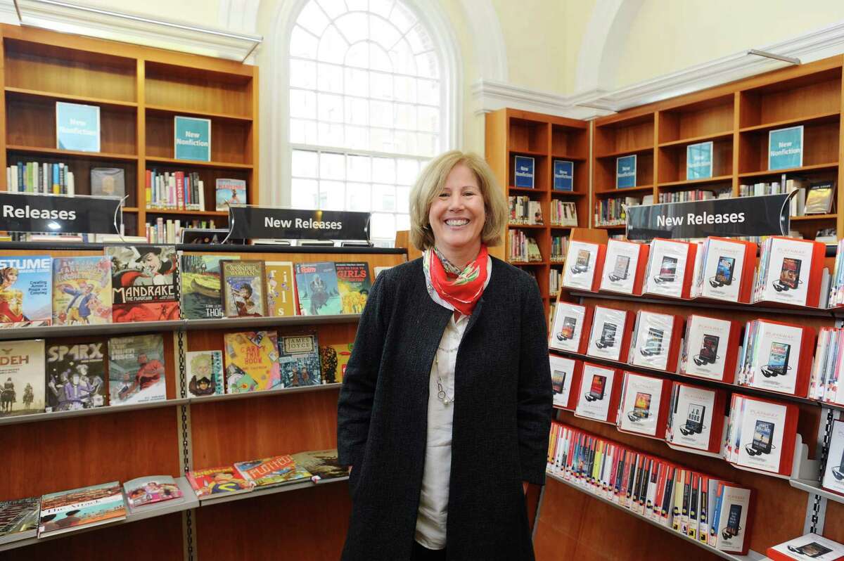 Ferguson Librarian Alice Knapp poses for a photo inside the main branch of the library in downtown Stamford, Conn. on Wednesday, April 5, 2017.