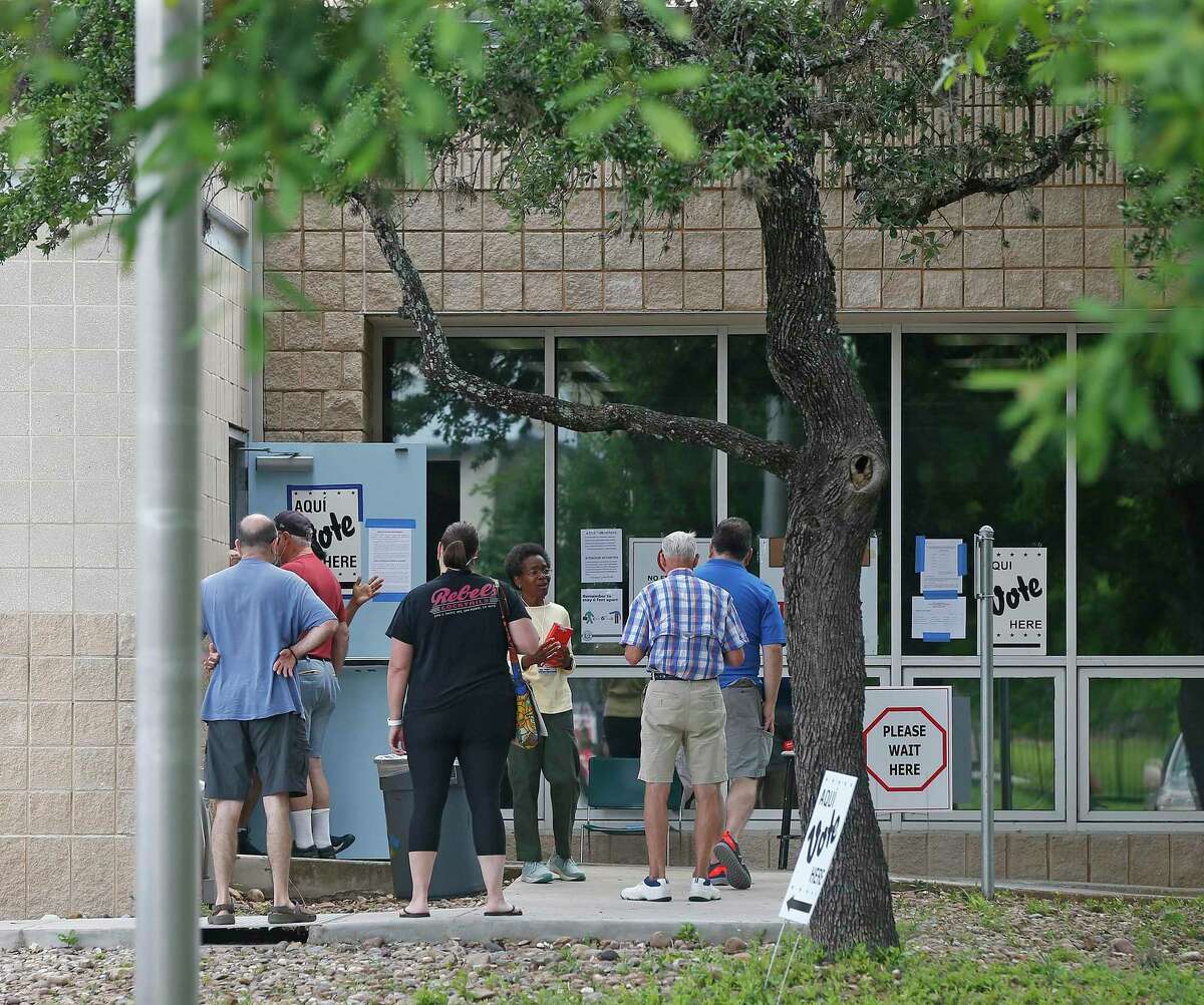 Voters at Brook Hollow Public Library on Saturday, June 5, 2021.