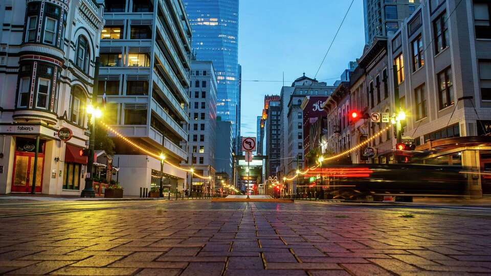 Businesses along Main Street, Tuesday, July 28, 2020, in downtown Houston. City and downtown officials, spurred by some bar owners and restaurateurs, are working on possible plans to use Main Street for outdoor dining.