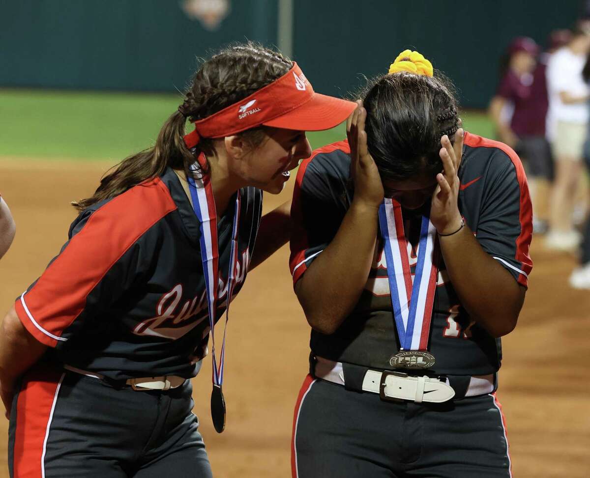 Judson Rockets players console each other following a 1-0 loss to Deer Park in the Class 6A state softball championship game on Saturday, June 4, 2021 in Austin, Texas.