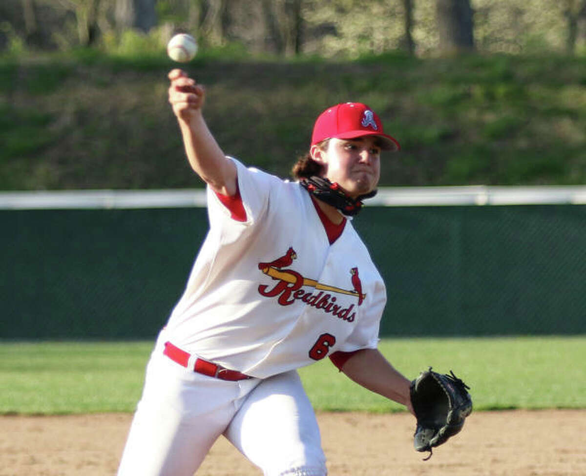 Alton senior Jackson Brooks, shown pitching earlier in an April game at Alton High, finished the season with a 1.02 ERA, but left with a no-decision after 6 1/3 innings in the Redbirds’ Class 4A regional semifinal loss Friday at Belleville West.