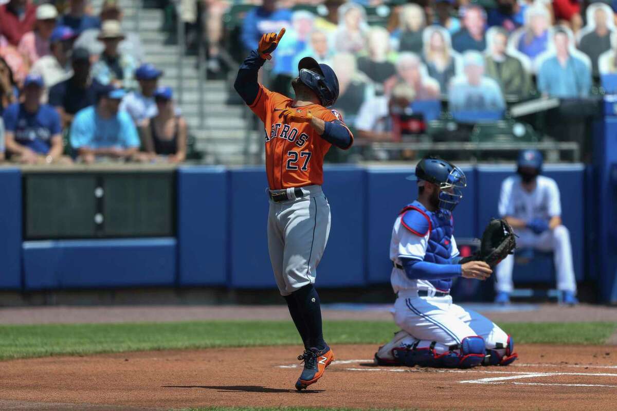Houston Astros' Jose Altuve (27) celebrates his home run during the first inning of the team's baseball game against the Toronto Blue Jays in Buffalo, N.Y., Sunday, June 6, 2021. (AP Photo/Joshua Bessex)