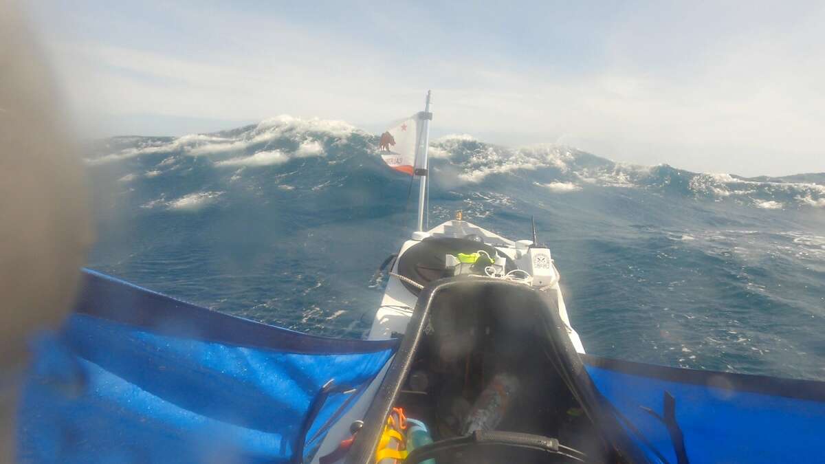 Kayaker Cyril Derreumaux faced rough conditions on the Pacific Ocean.