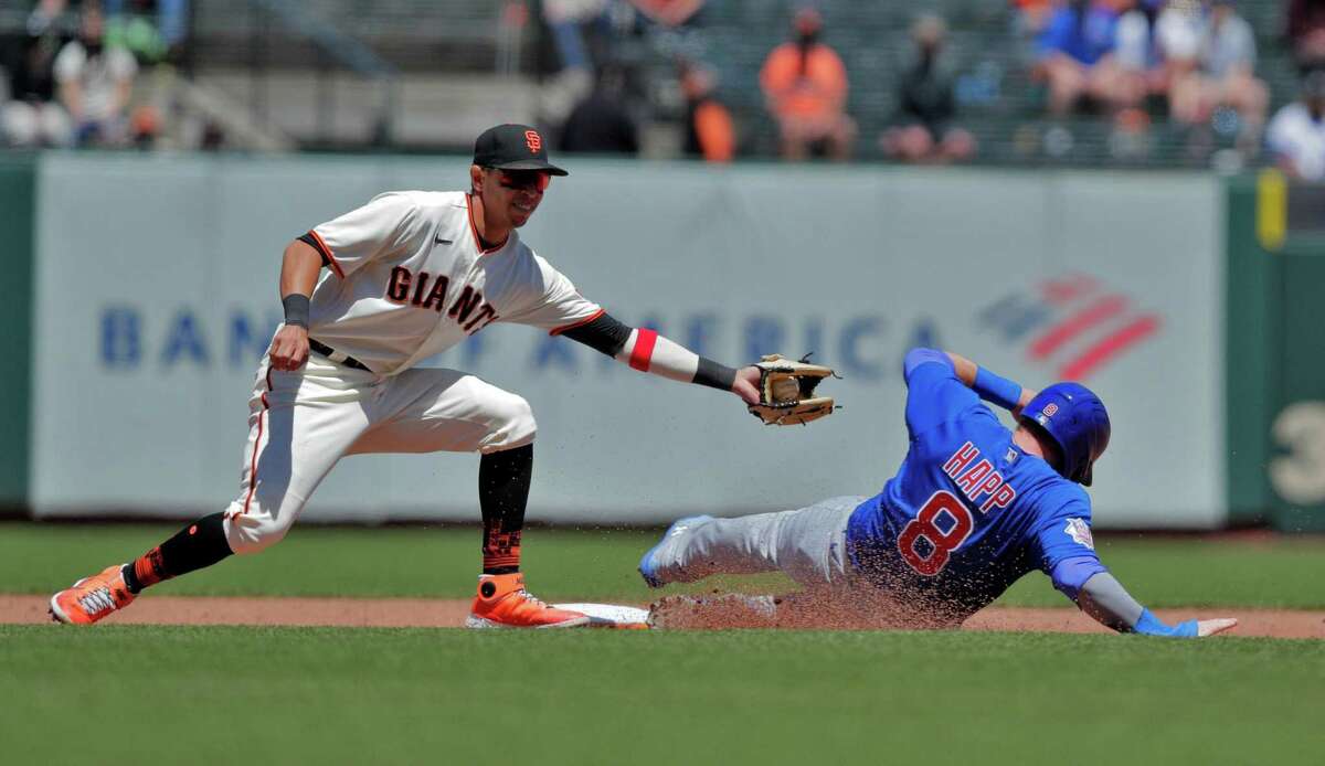 Ian Happ (8) safe on the double play attempt from first to Mauricio Dubon (1) in the fourth inning as the San Francsico Giants played the Chicago Cubs at Oracle Park in San Francisco, Calif., on Sunday, June 6, 2021.
