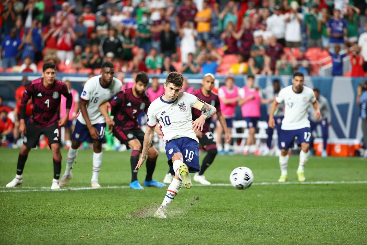Christian Pulisic of the United States scores a penalty kick goal during the CONCACAF Nations League Championship Final between United States and Mexico at Empower Field at Mile High on June 6, 2021 in Denver, Colorado.