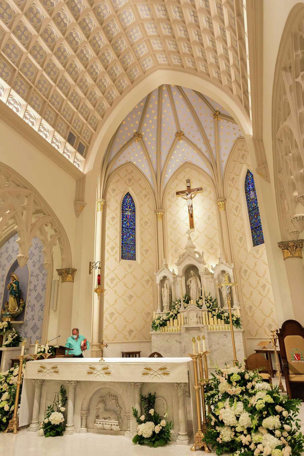 The altar of the newly renovated San Agustin Cathedral is cleared after a mass, Sunday, June 6, 2021.