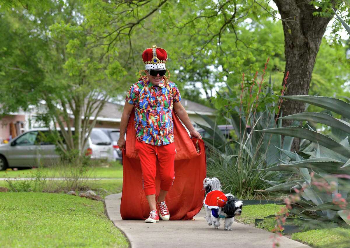 Michael Quintanilla, known to many as “Mr. Fiesta,” marked what would have been the first day of Fiesta 2020 by wearing Fiesta regalia as he walked his dog Charlie. Quintanilla is looking forward to getting back to the celebration this year.