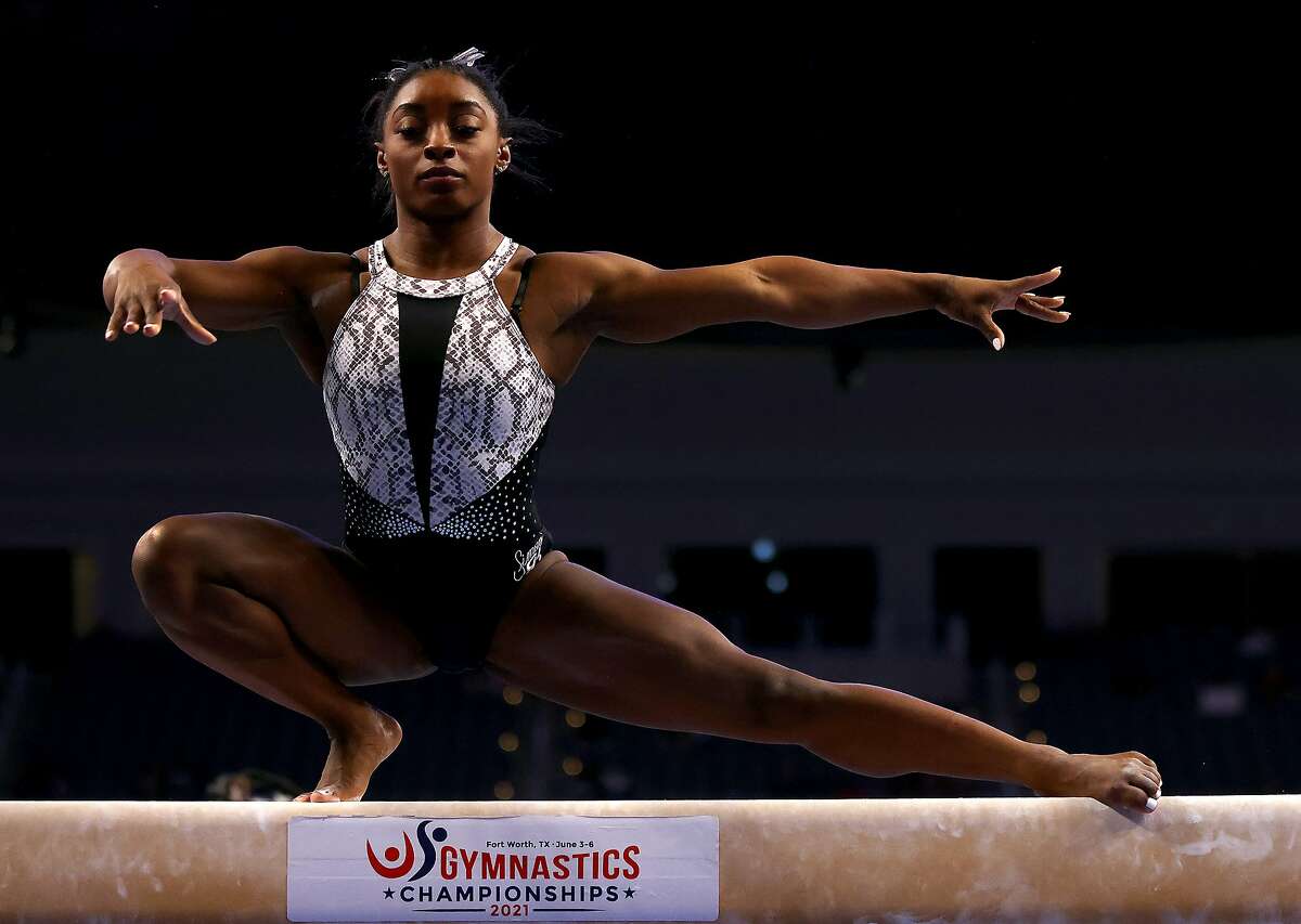 Simone Biles warms up on the beam prior to the Senior Women’s competition of the U.S. Gymnastics Championships at Dickies Arena on in Fort Worth, Texas. She earned a record seventh U.S. title in the event.